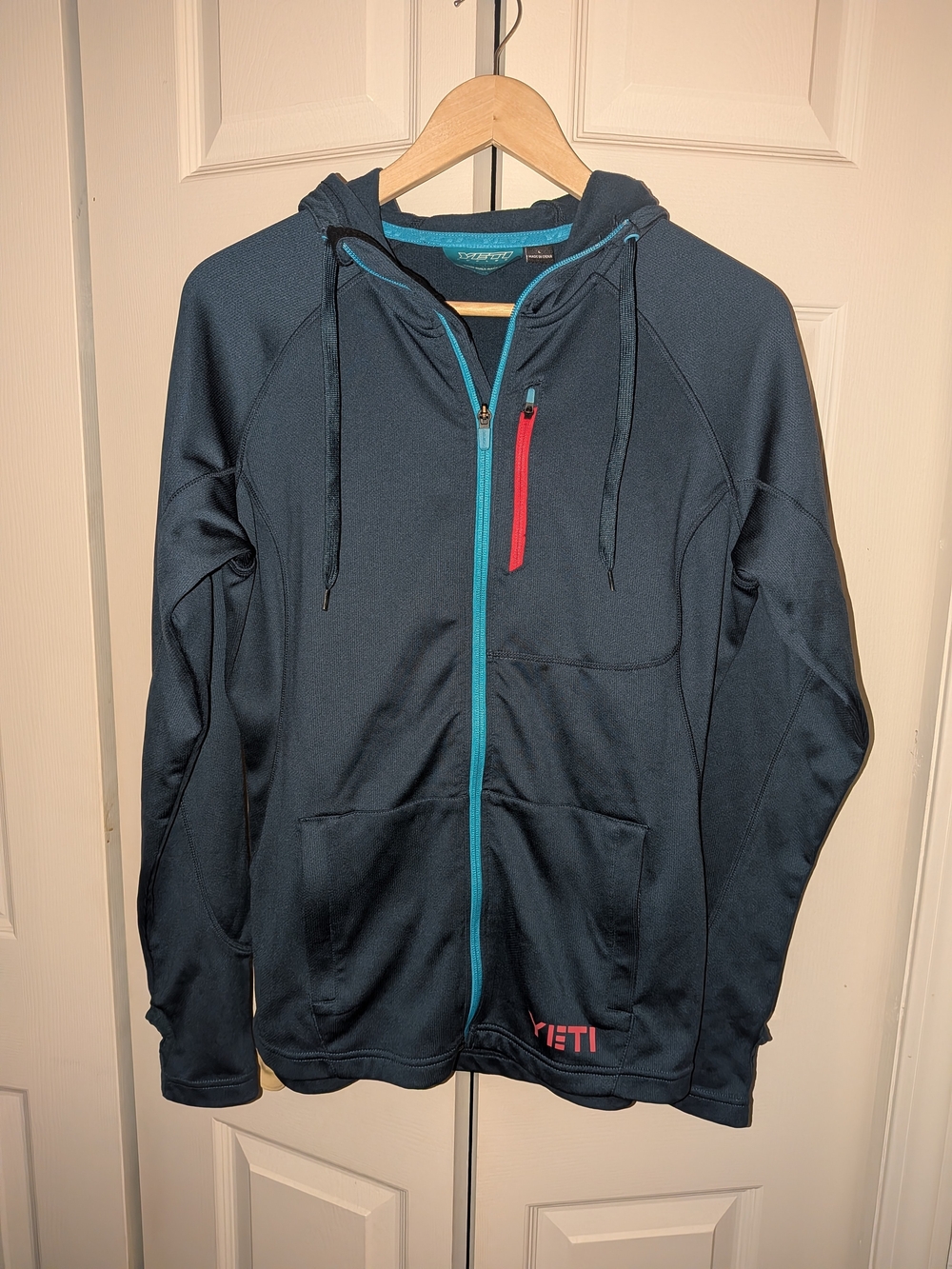 Yeti Navy Full-Zip Hoodie with Teal and Red Accents